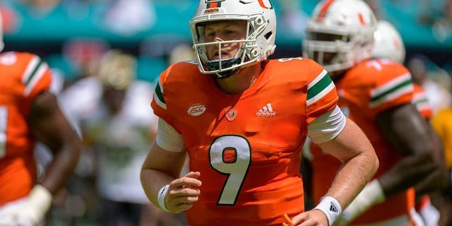 Miami quarterback Tyler Van Dyke (9) jogs on the field before the college football game between the Southern Miss Golden Eagles and the University of Miami Hurricanes on Sept. 10, 2022 at the Hard Rock Stadium in Miami Gardens, FL. 