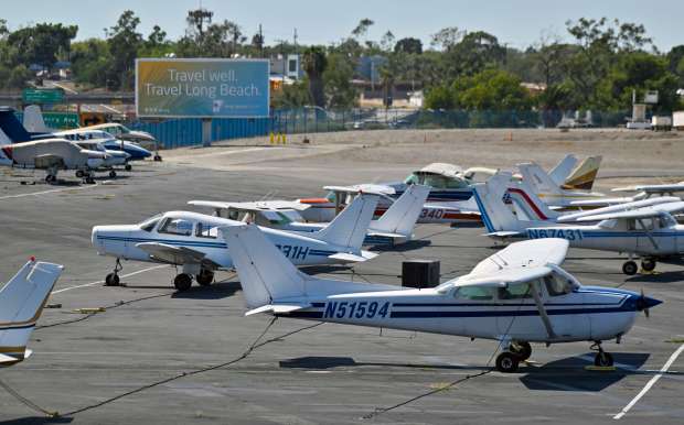 General aviation aircraft sit at Long Beach Airport in Long...