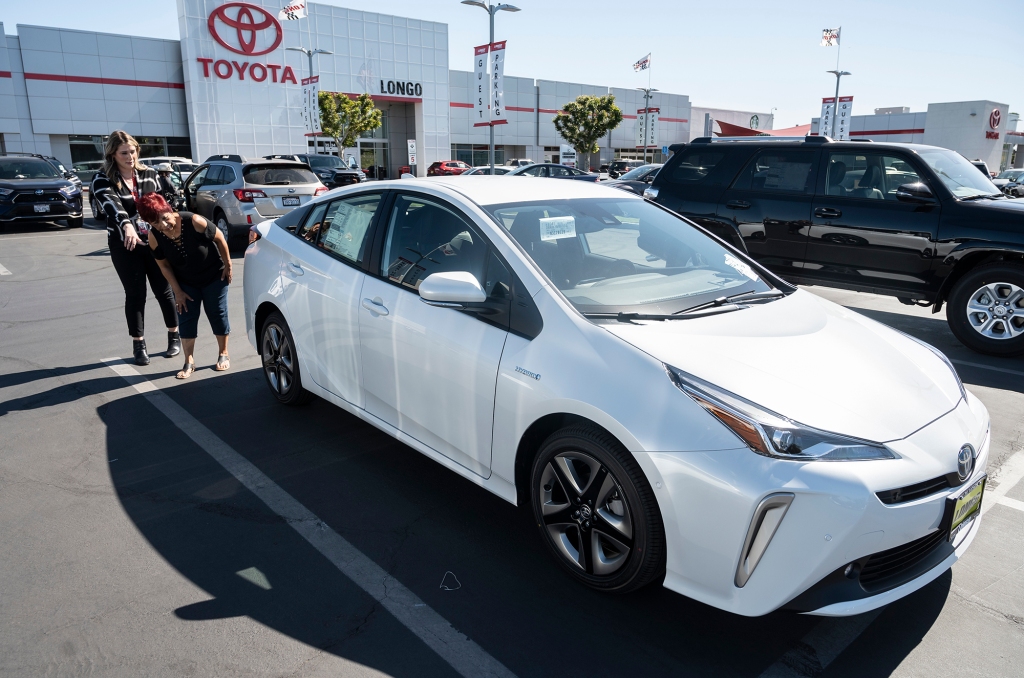 A customer is shown a 2022 Toyota Prius.